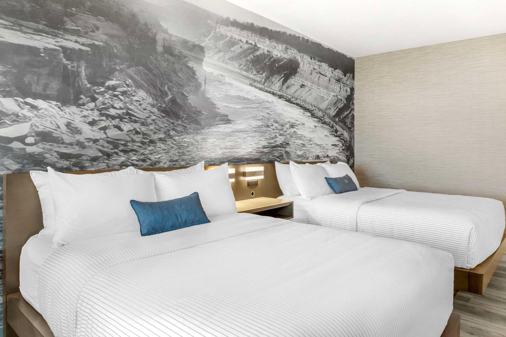 Quadruple Room with Two Queen Beds and Water View - Non Smoking
